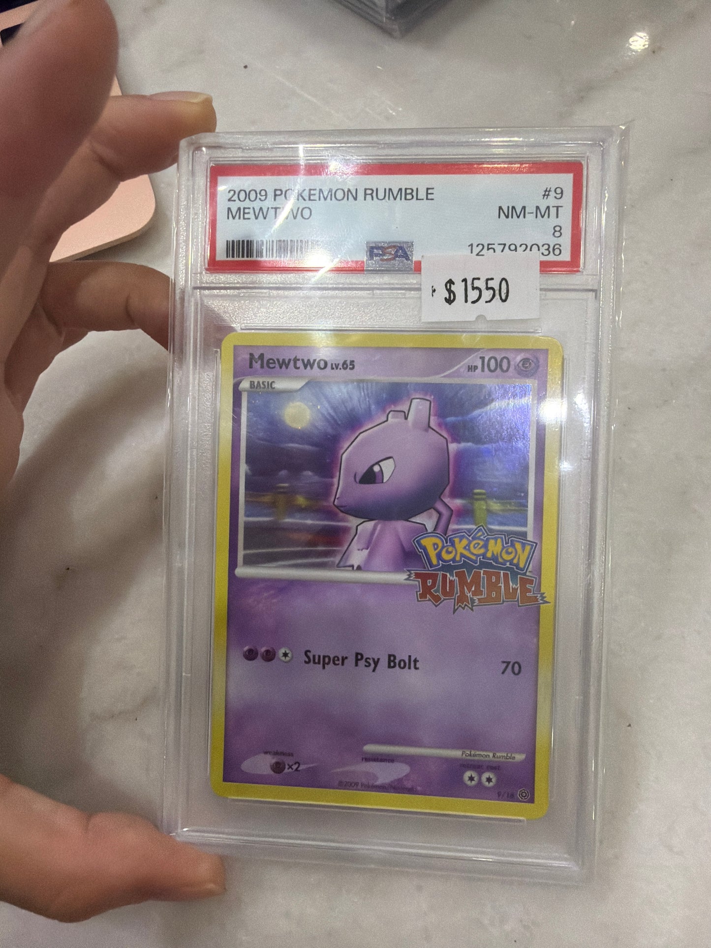 Holo Rumble Mewtwo PSA 8